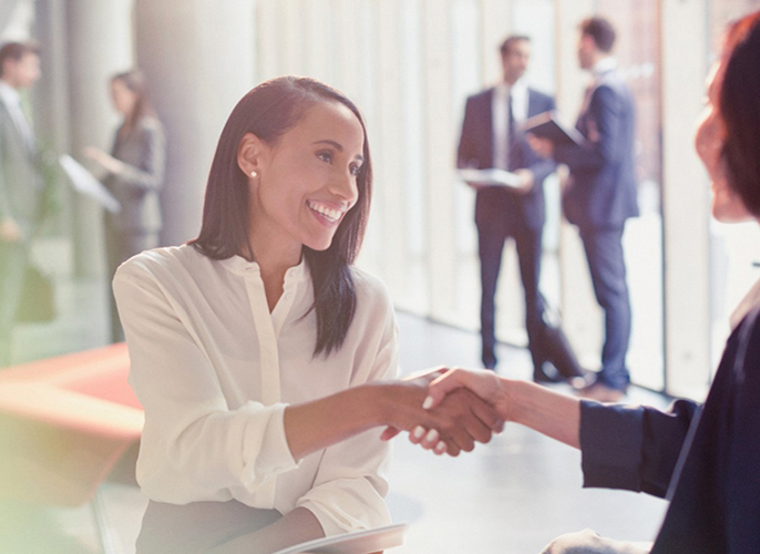 Picture of two businesswomen shaking hands